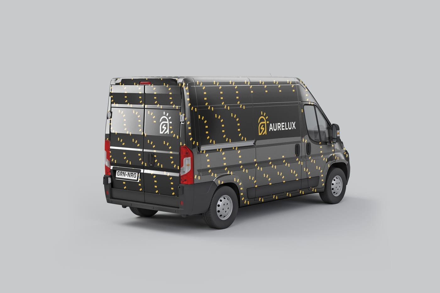 A black work van wrapped in the gold Aurelux mark pattern.