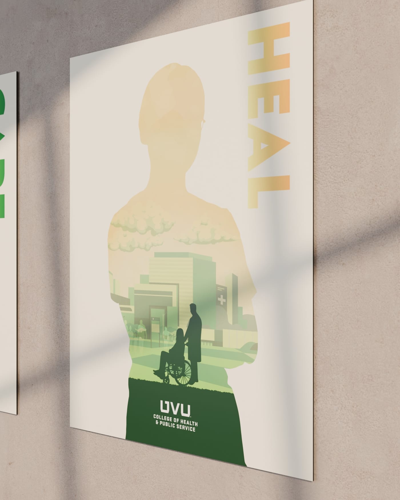The HEAL poster, mounted on black-core board, on a hallway wall in raking window light.