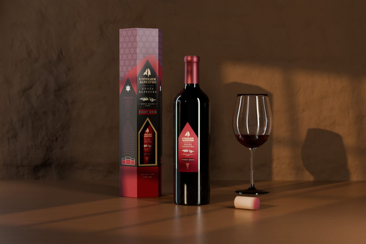 The hexagonal L'Atelier Alpestre wine box beside a Bordeaux bottle and a glass of red wine, lit by low window light on a walnut table.